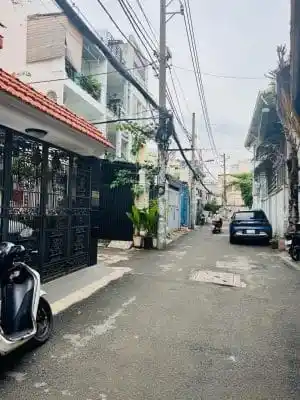 Bán nhà Nơ Trang Long, Bình Thạnh – đường trước nhà, hẻm xe hơi, quỹ đất hơn 80m² (4,2m × 20m), 5 phòng ngủ